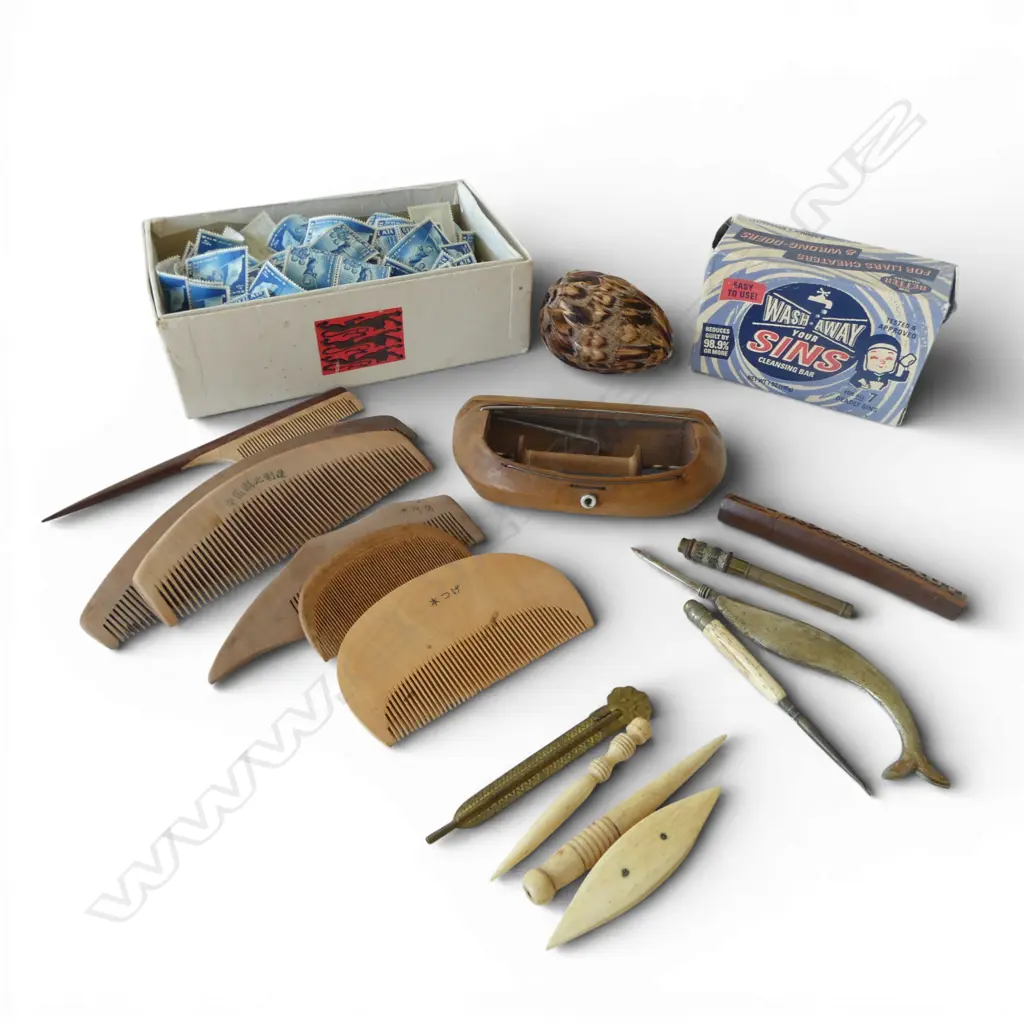 FEATHERED EGG, ASST. WOODEN COMBS, NARROW FABRIC SHUTTLE, & OTHER SEWING ITEMS including some bone + HEALTH STAMPS Image 1++