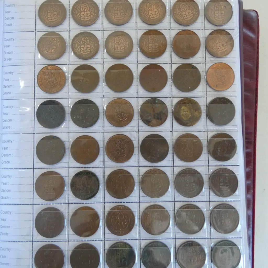 3 ALBUMS OF NZ & WORLD COINS Image 1++