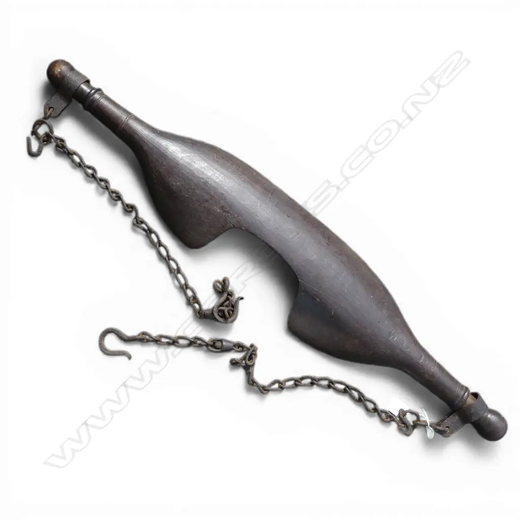 # A 19thC fruitwood human yolk with chains Image 1++