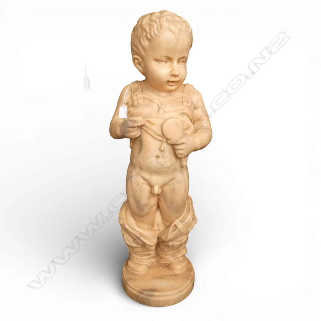 Carved orange marble sculpture boy with his pants down on circular base H870mm Image 1++