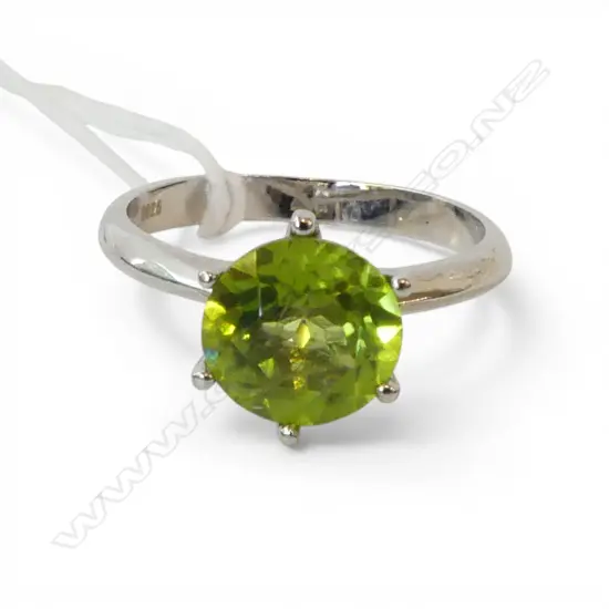 SILVER & PERIDOT RING, AIG REPORT