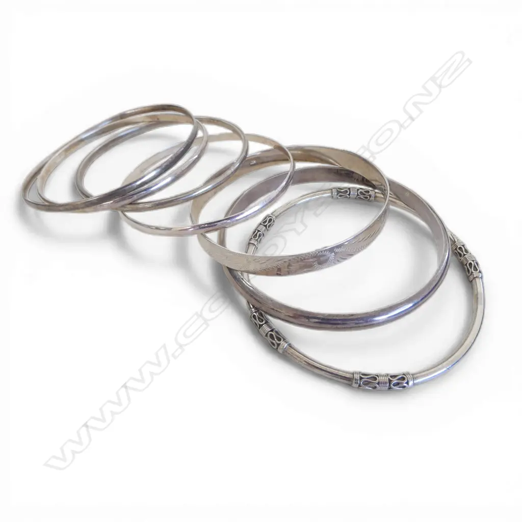 COLLECTION OF 7 S/SILVER BANGLES 72GMS Image 1++