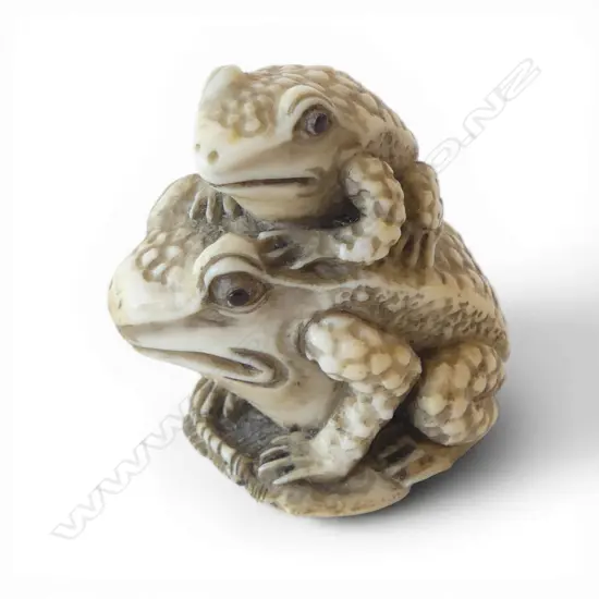 JAPANESE CARVED IVORY NETSUKE frog perched on frog, SIGNED H.140mm