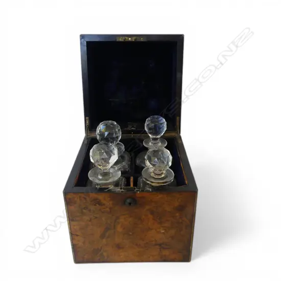 VICTORIAN BURR WALNUT CAMPAIGN TYPE 4 BOTTLE TANTULUS w brass fittings. 4 asst. decanters enclosed a few faults. H.280mm