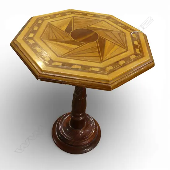NZ TIMBERS OLD OCTAGONAL SHAPED OCCASIONAL TABLE ON SINGLE PEDESTAL, TOP WITH iNLAYS OF REWAREWA KOHEKOHE ETC THE BASE O