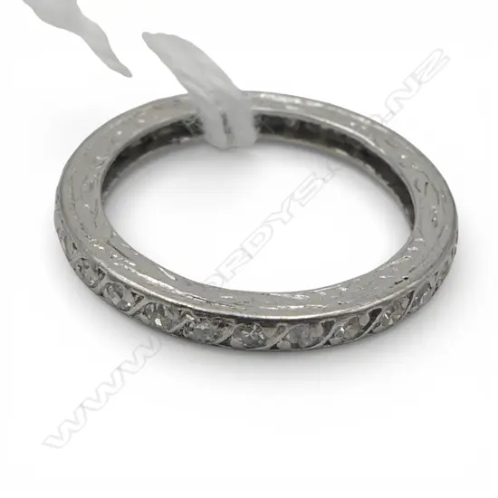 PLATINUM AND DIAMOND BAND 1.34gms VERY small size D. VALUATION