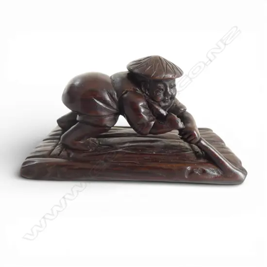 JAPANESE CARVED WOOD NETSUKE OF THE RAFT, SIGNED, L.62mm