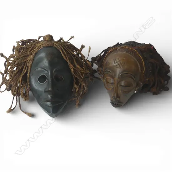 2 TRIBAL CARVED WOODEN MASKS H.260mm