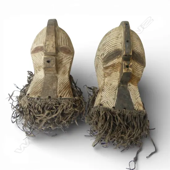 2 TRIBAL CARVED WOODEN MASKS H.300mm