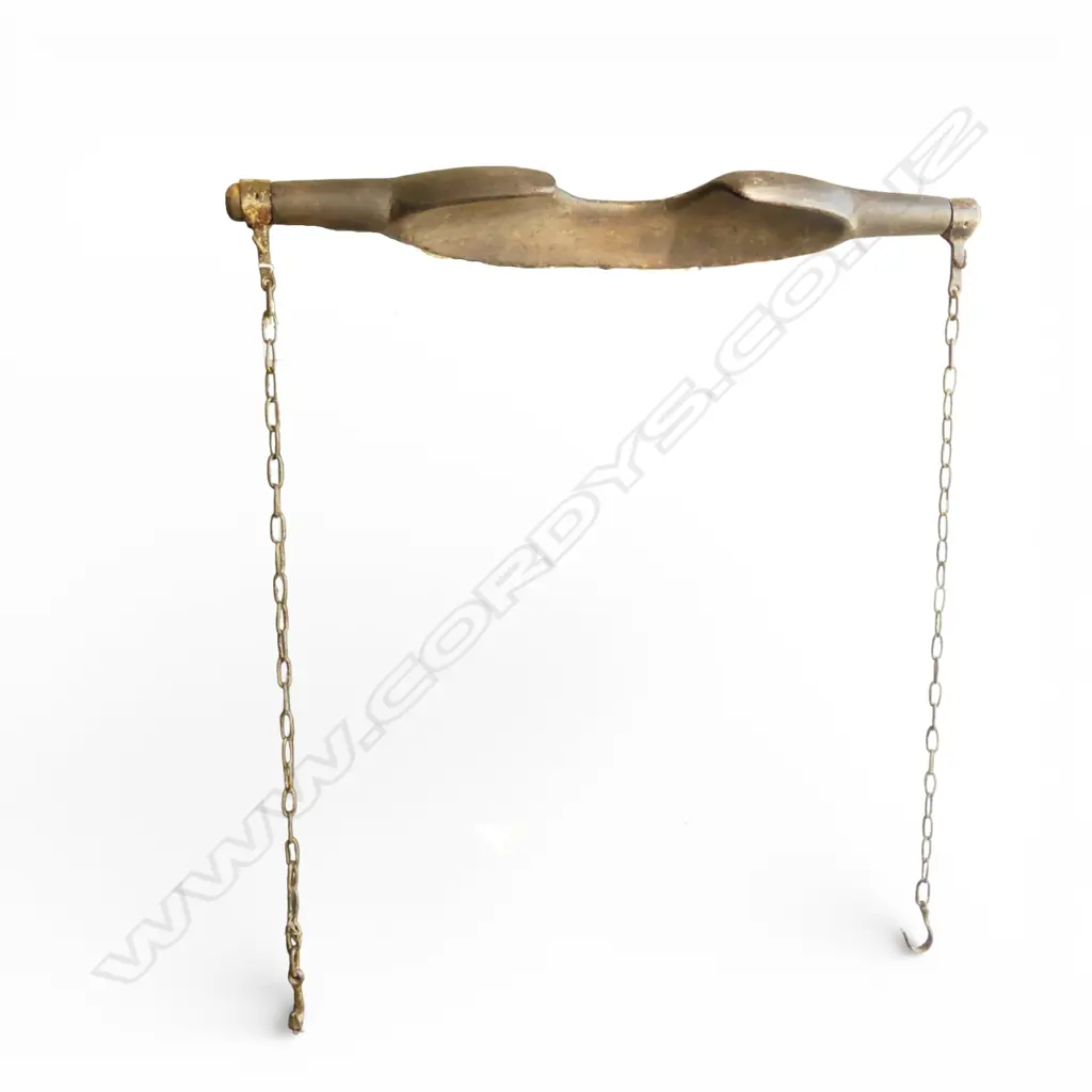 # A 19thC fruitwood human yoke with chains Provenance: From the estate of Adrian Michael Garrett of Kerikeri. Image 1++