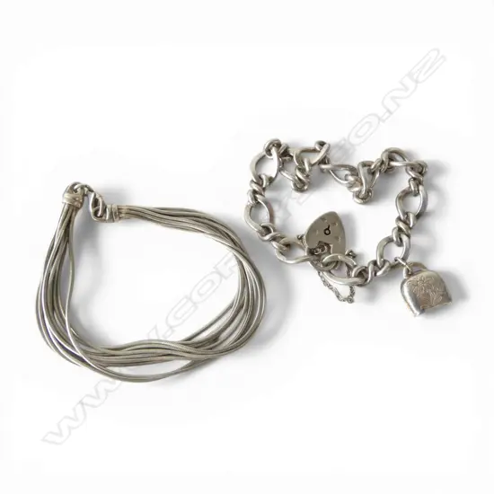 2 SILVER BRACELETS: lge twisted link + multi strand 40gms