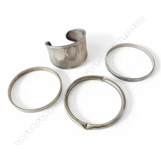 STG SILVER BANGLE + 3 OTHERS two testing low grade silver 