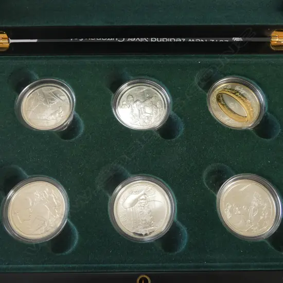 CASED 2003 N.Z. THE LORD OF THE RINGS COIN SET, SCENES IN SILVER, 6x $1 .925 SILVER, 169.68gms TW