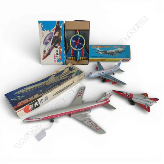 4 VINTAGE TIN PLANE TOYS with asst. boxes