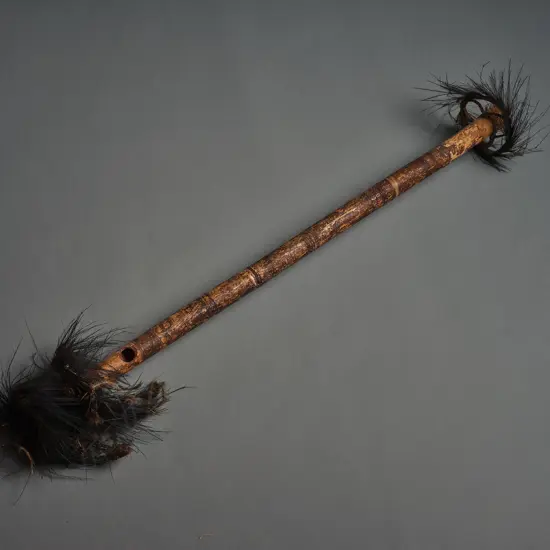 PNG Sepik River ceremonial flute, decorated bamboo with feather & woven discs, L.860mm