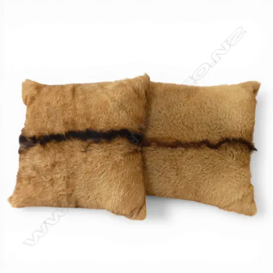 A PAIR OF ANIMAL HIDE CUSHIONS 440 MM SQ