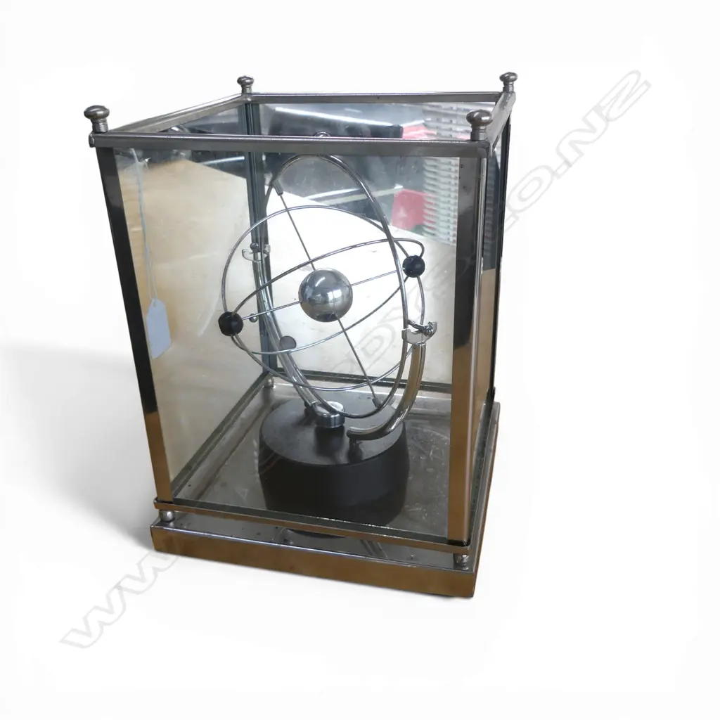 PERPETUAL ROTATING ATOM IN CASE Image 1++