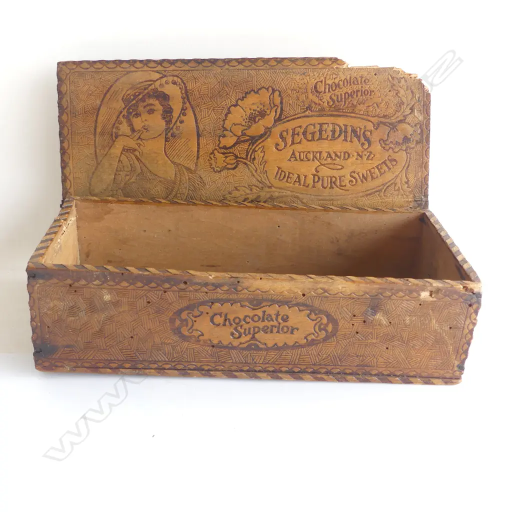 A wooden pokerwork chocolate box made for Segedin's (Auckland) c. 1910-1920, Image 1++