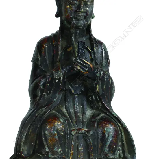 A Chinese lacquered and gilded metal figure of a scholar