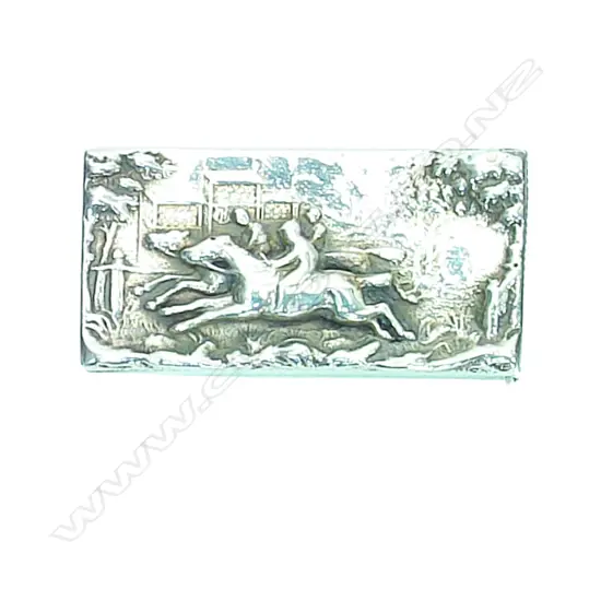 A Victorian silver vesta case embossed with a horse racing scene