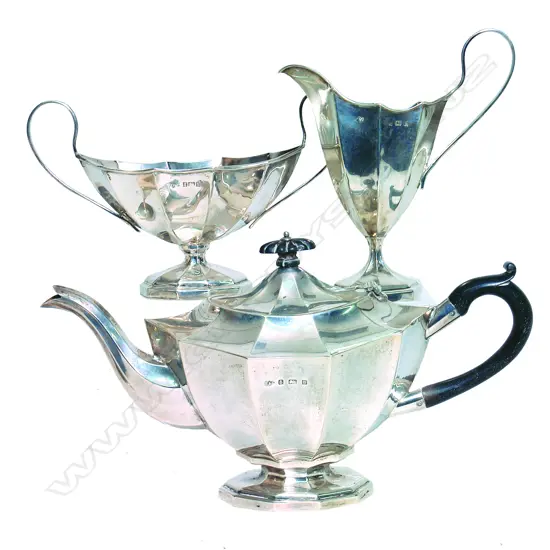 An Edwardian three piece silver Adam style tea service