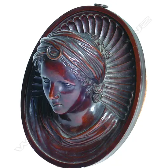 A 19thC bronze portrait wall bust of Selene
