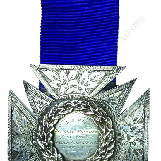 A large 19thC New Zealand silver engraved presentation Maltese Cross