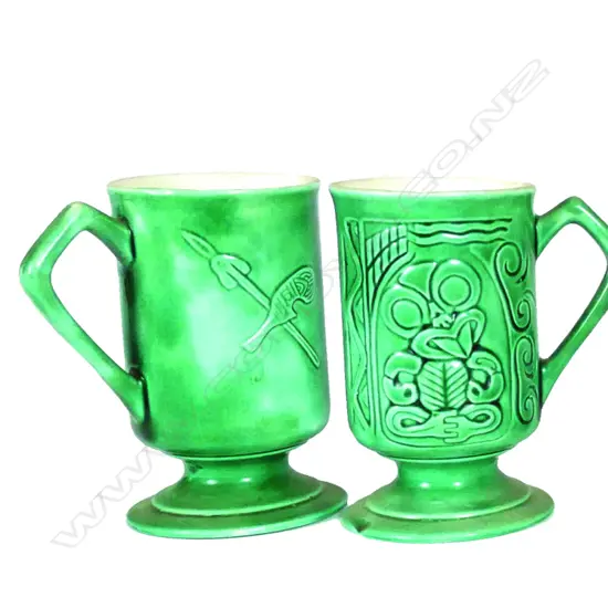 A pair of Titian studio mugs