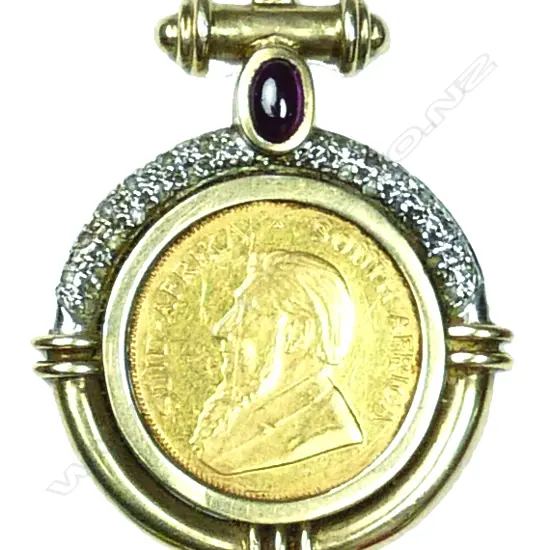A ¼ Krugerrand gold coin in 9ct. gold mount