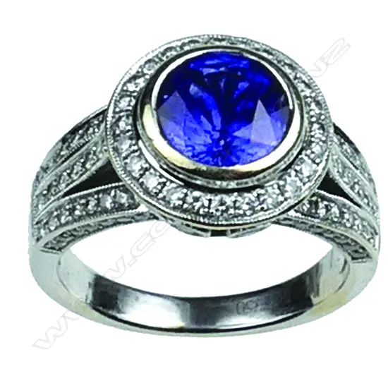 An 18ct. white gold sapphire and diamond ring