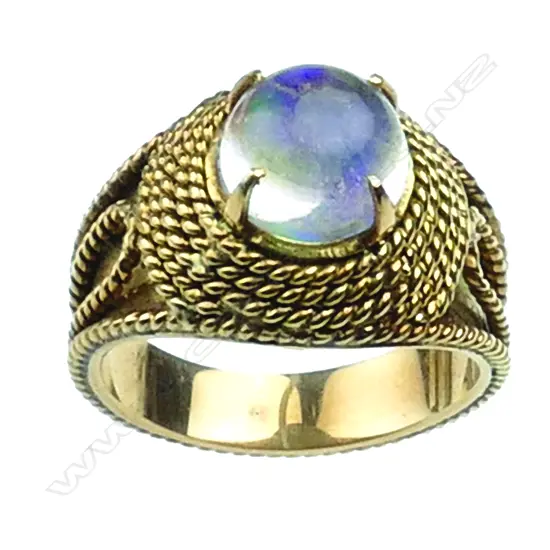 An 18ct. yellow gold and moonstone ring