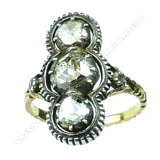 An antique 14ct gold and three stone diamond ring