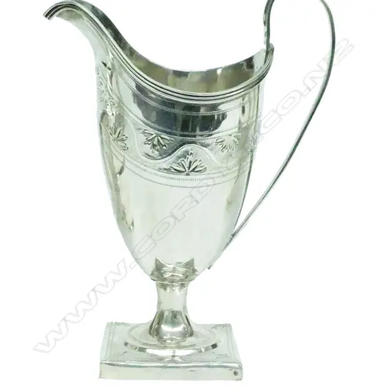 A George III silver helmet cream jug