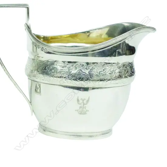 A Geo. III silver flat bottom cream jug