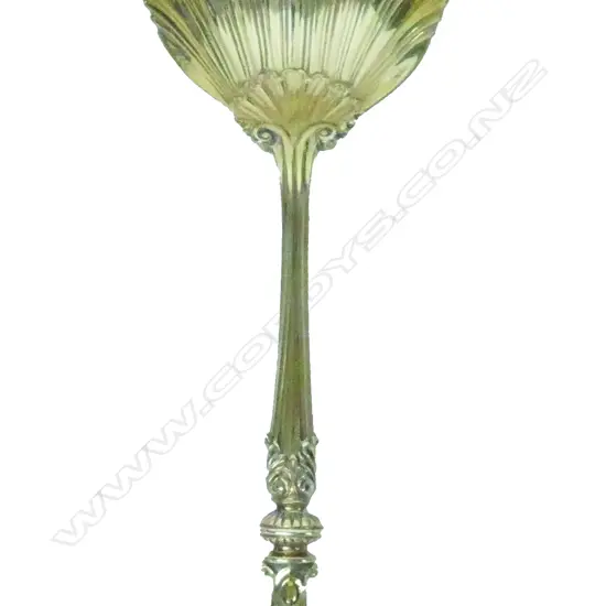 An Edwardian silver gilt serving spoon in the neoclassical manner