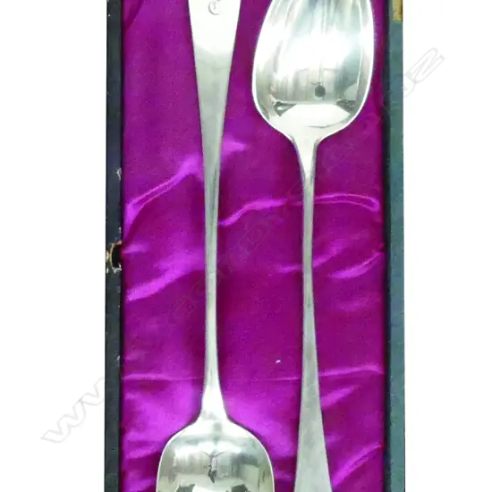 A pair of George III silver pie spoons