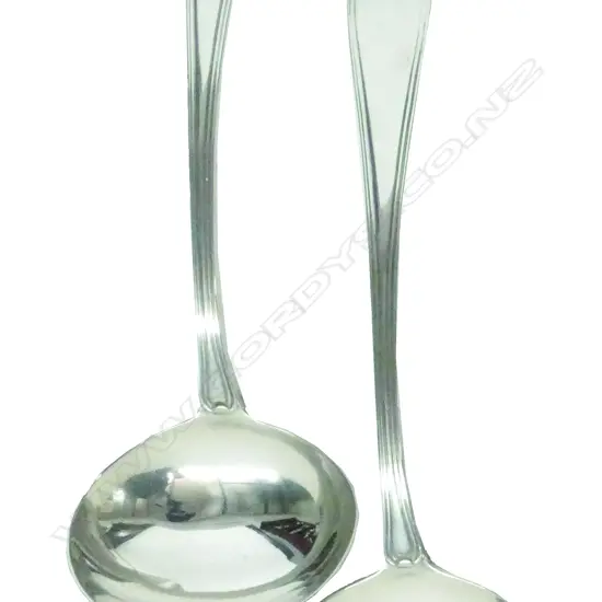 Two silver sauce ladles