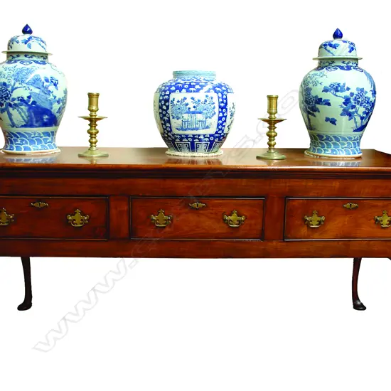 A 19thC French fruit wood dresser base