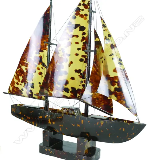 A vintage tortoiseshell constructed model yacht