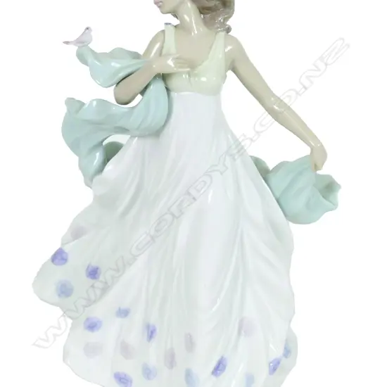 A Lladro porcelain figure 'Summer Serenade' modelled by Regino Torrijos