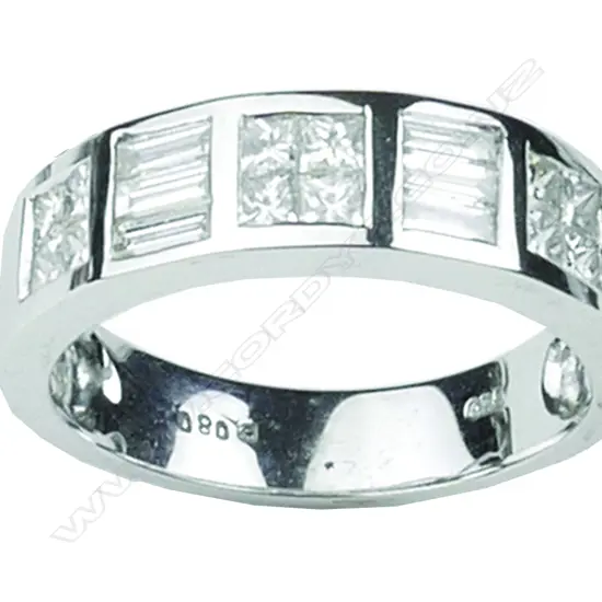 An 18ct. white gold eternity band type ring