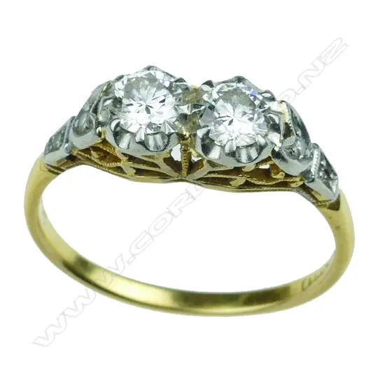 A lady's estate 18ct. yellow gold and two-diamond ring