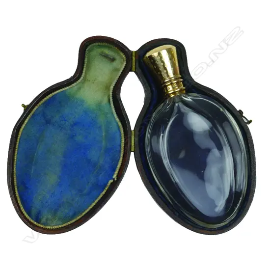 CASED PERFUME BOTTLE