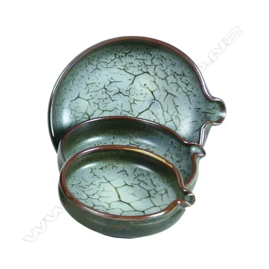 A set of three Len Castle pouring bowls