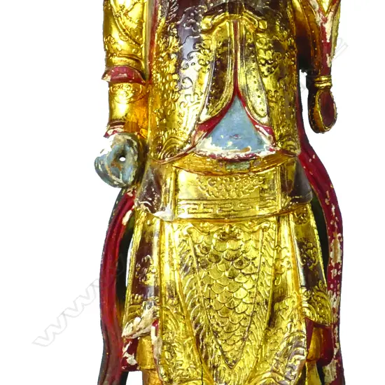An Chinese carved wood temple guardian figure