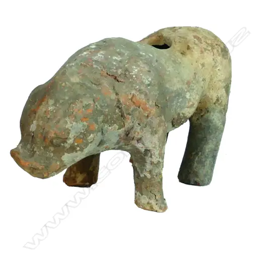 An early archaic earthenware figure of a pig