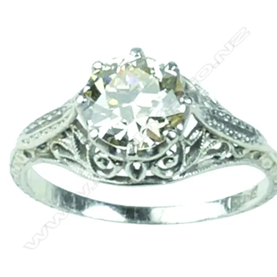An estate platinum and diamond solitaire ring