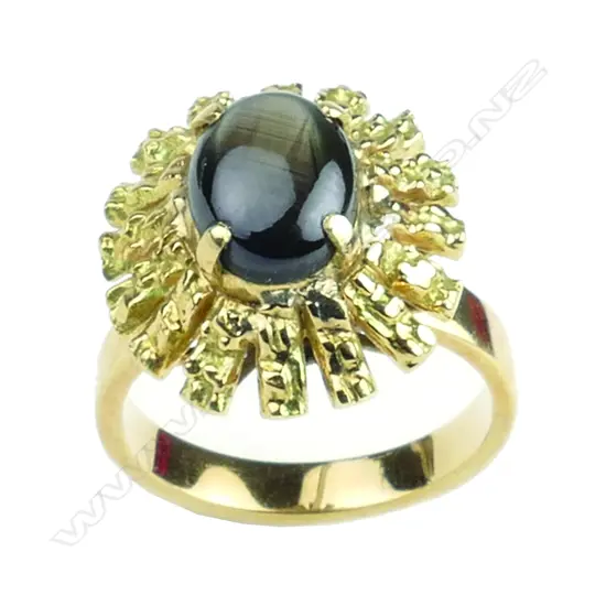 A retro 15ct gold and black star sapphire ring