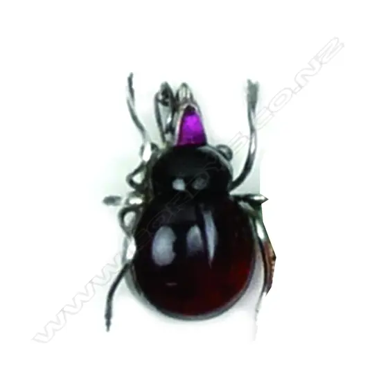 A vintage large silver and coloured stone beetle brooch