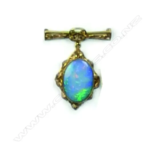 An early 20thC 9ct. gold and opal pendant/brooch